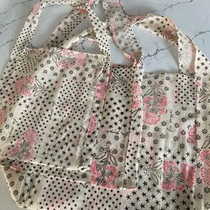 Free People shopping bags.